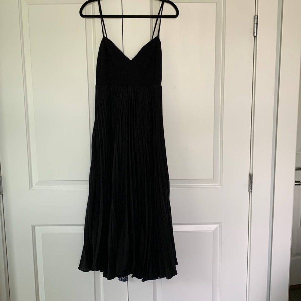 Anthropologie black pleated midi dress